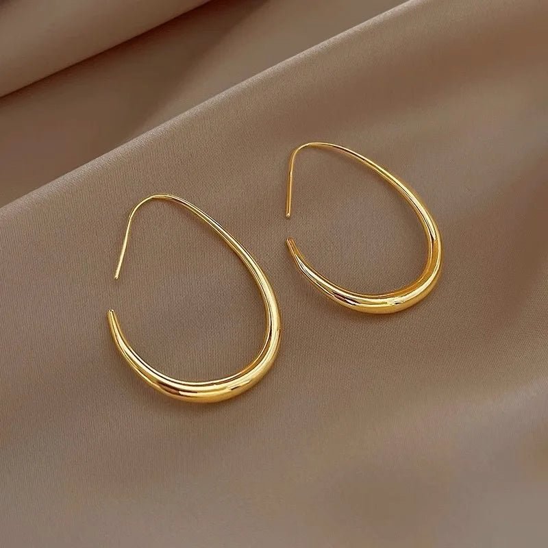 Boucles Minimalistes Dorées — Chic & Intemporelles - FoytiShop