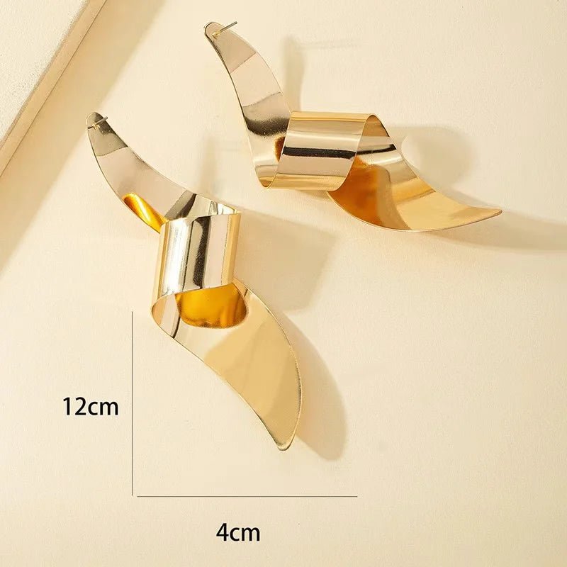 Une paire de boucles d'oreilles à clous pour femmes - FoytiShop