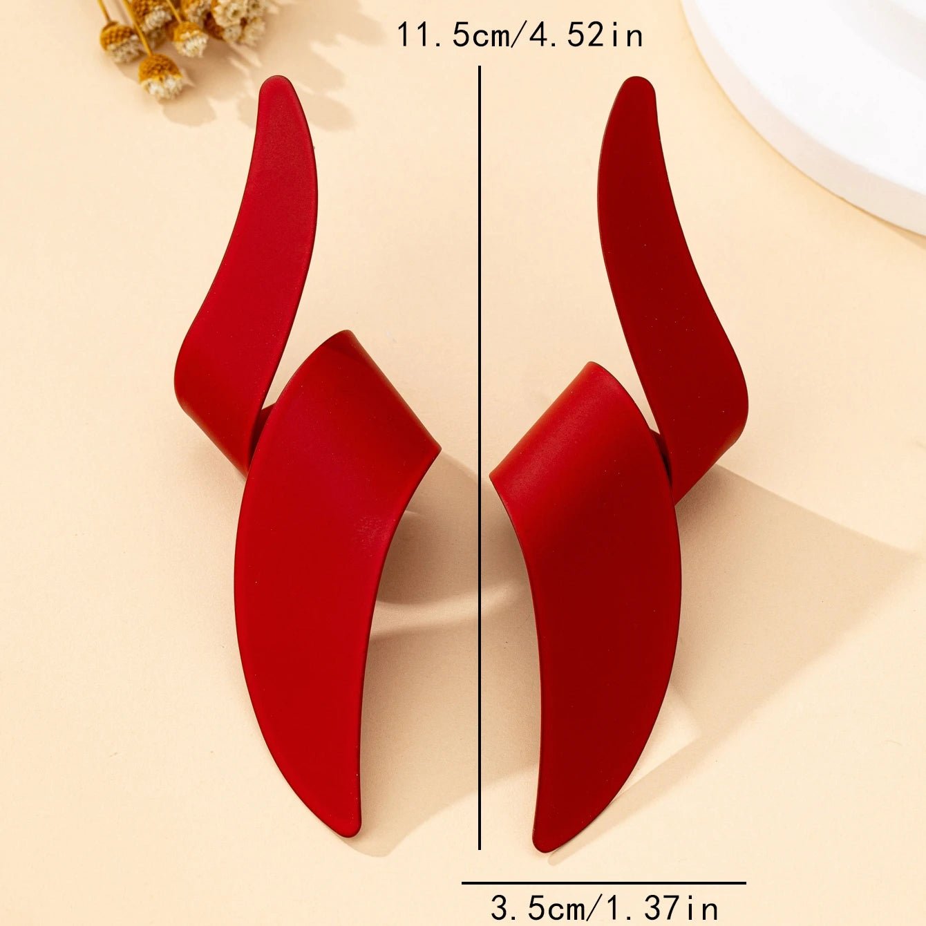 Une paire de boucles d'oreilles à clous pour femmes - FoytiShop