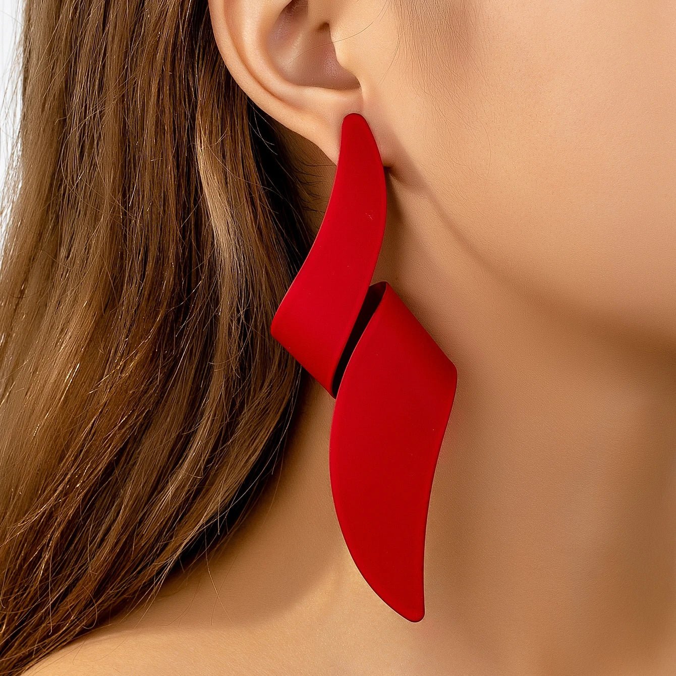 Une paire de boucles d'oreilles à clous pour femmes - FoytiShop