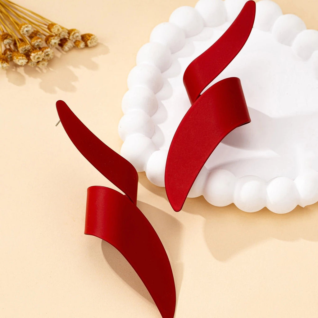 Une paire de boucles d'oreilles à clous pour femmes - FoytiShop