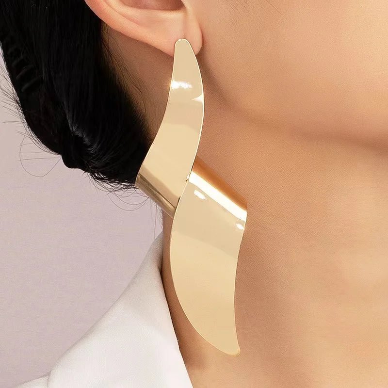 Une paire de boucles d'oreilles à clous pour femmes - FoytiShop