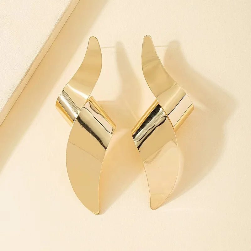 Une paire de boucles d'oreilles à clous pour femmes - FoytiShop