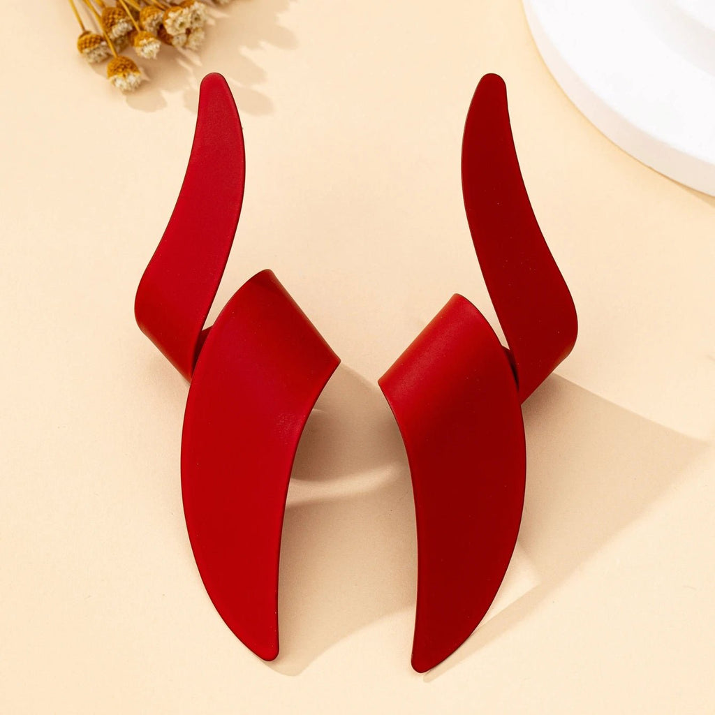 Une paire de boucles d'oreilles à clous pour femmes - FoytiShop