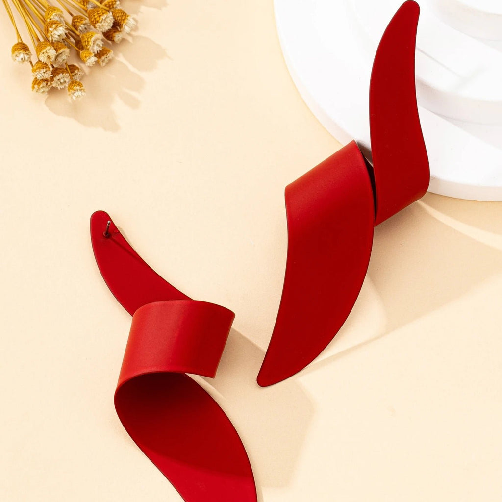 Une paire de boucles d'oreilles à clous pour femmes - FoytiShop