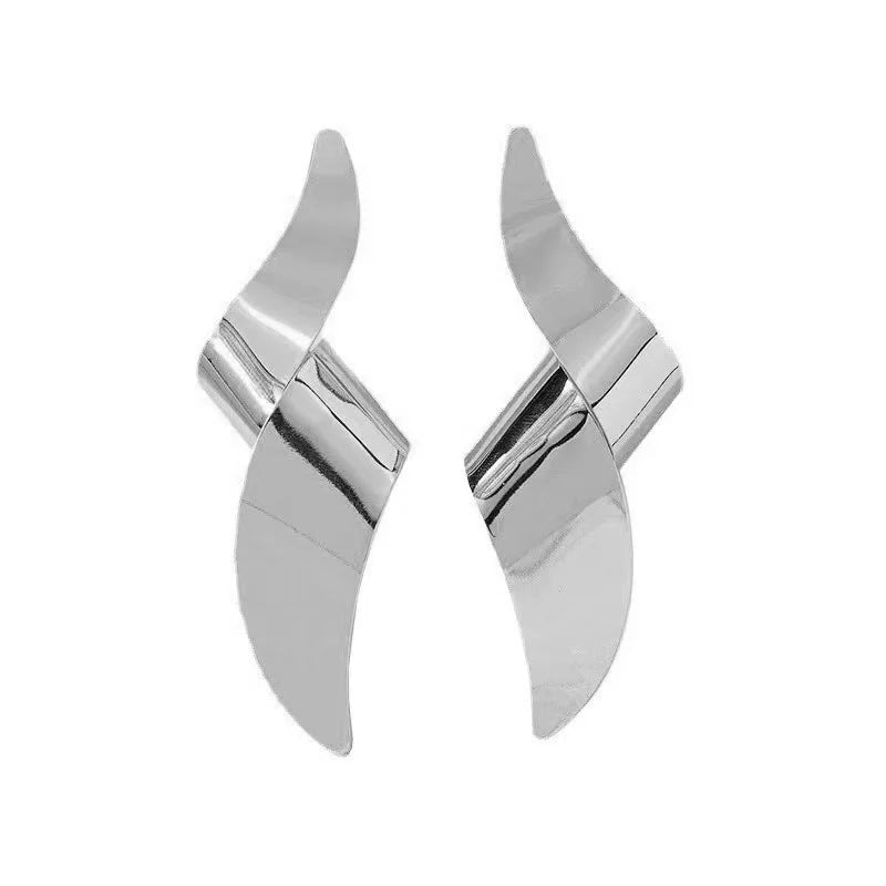 Une paire de boucles d'oreilles à clous pour femmes - FoytiShop