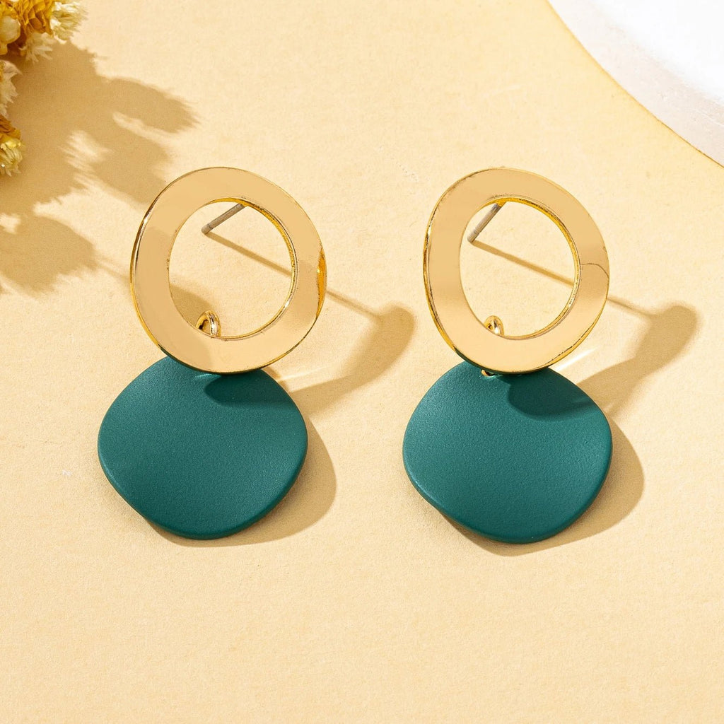 Une paire de boucles d'oreilles pour femmes, motif ondulé, disque rond - FoytiShop