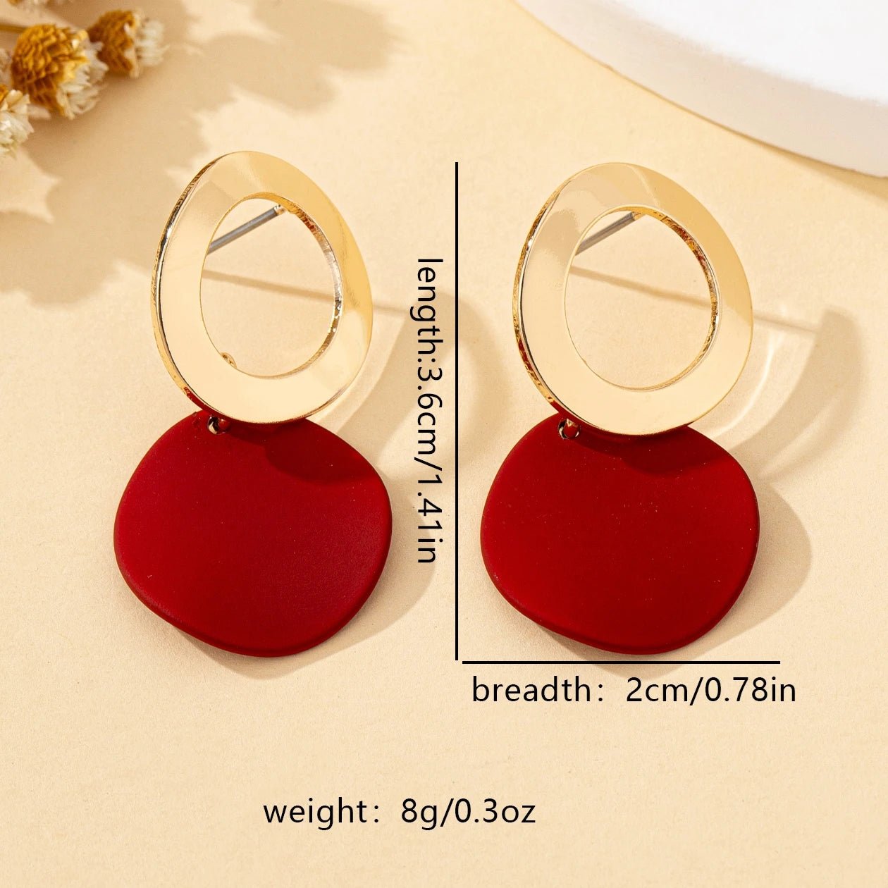 Une paire de boucles d'oreilles pour femmes, motif ondulé, disque rond - FoytiShop