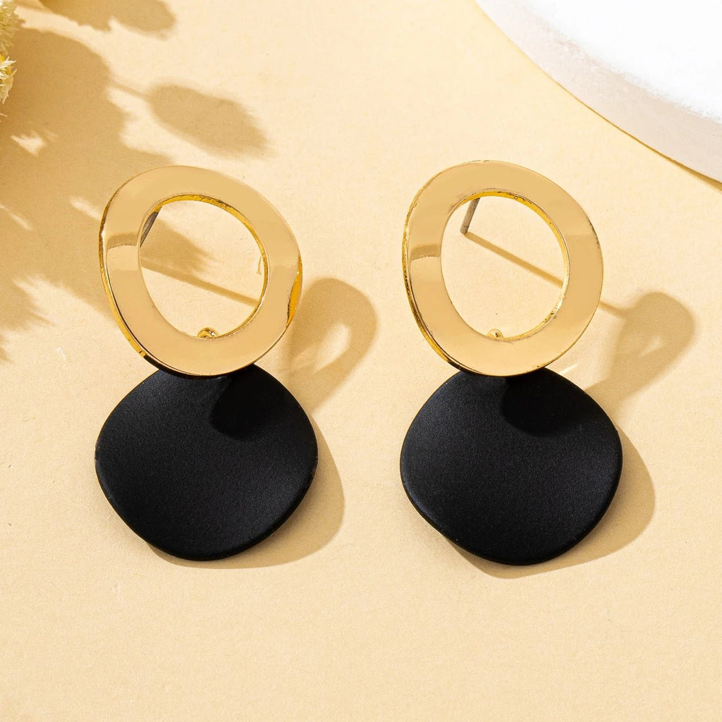 Une paire de boucles d'oreilles pour femmes, motif ondulé, disque rond - FoytiShop
