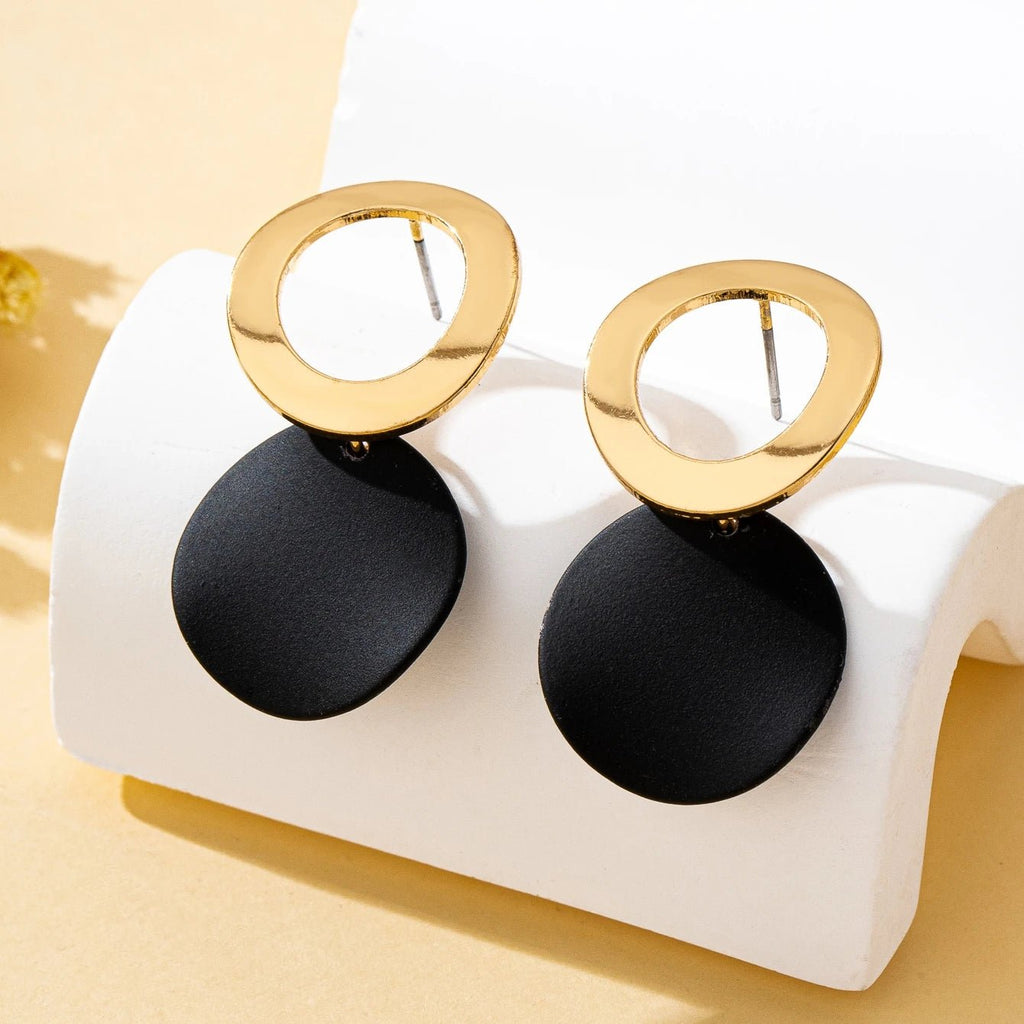 Une paire de boucles d'oreilles pour femmes, motif ondulé, disque rond - FoytiShop